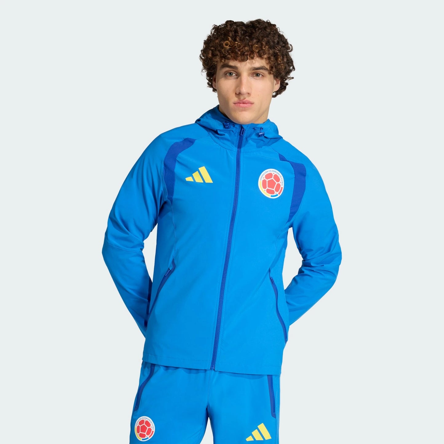 Chaqueta Colombia Azul Vivo Impermeable Capucha Encauchetada