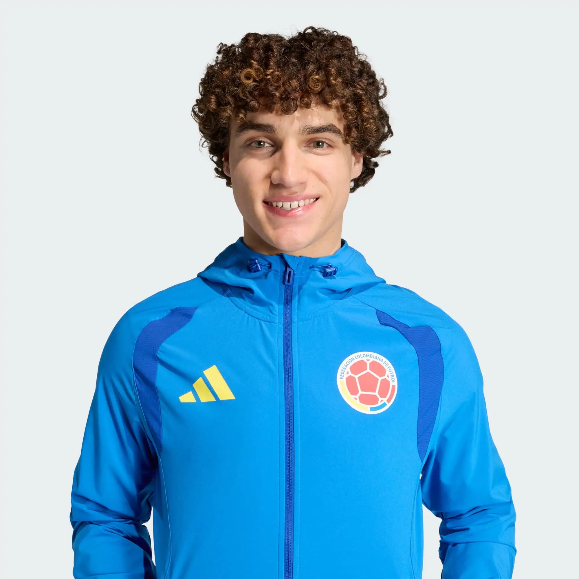 Chaqueta Colombia Azul Vivo Impermeable Capucha Encauchetada